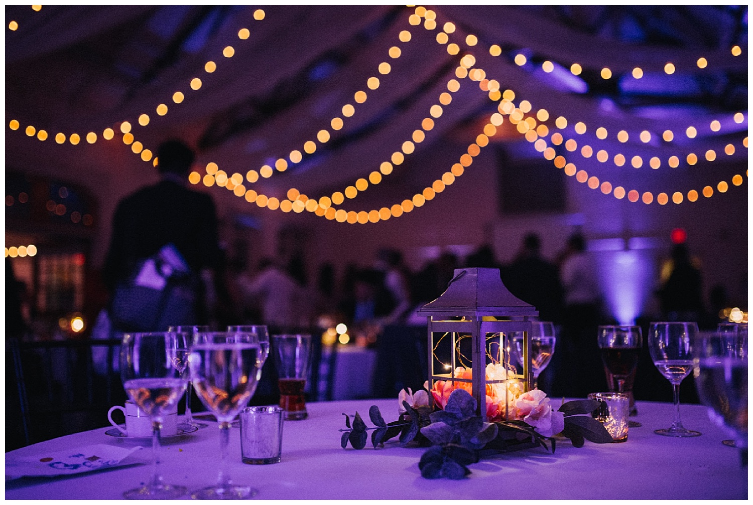 candle centerpieces at night in wedding reception