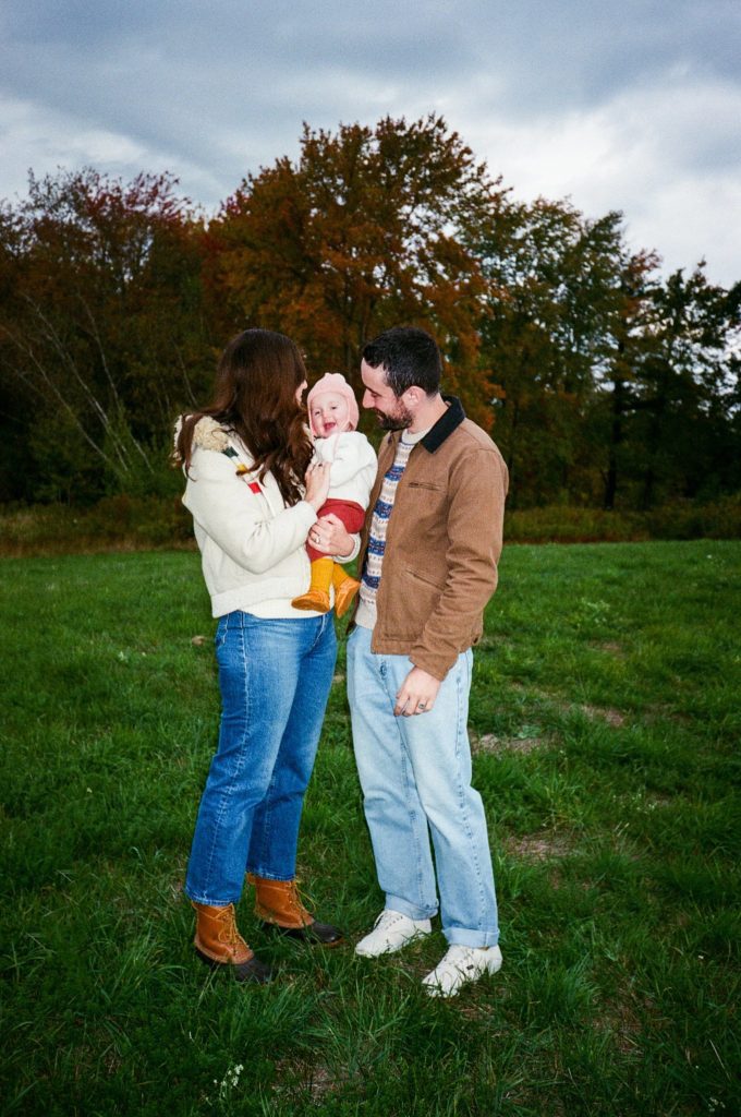 a family poses for analog portraits