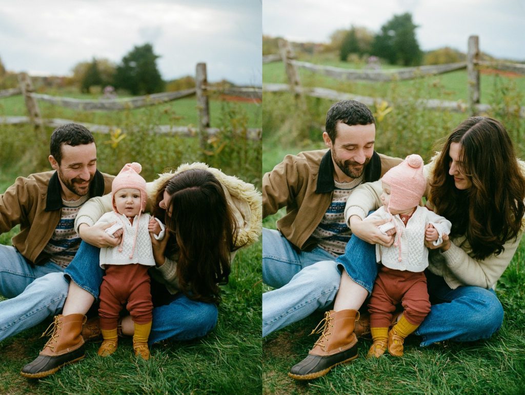 a mother and father cuddle their daughter during a family session on film