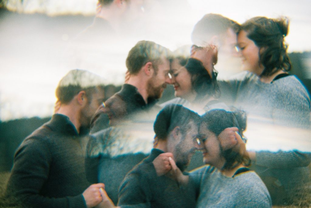 Multiple exposure of engaged couple with their heads together