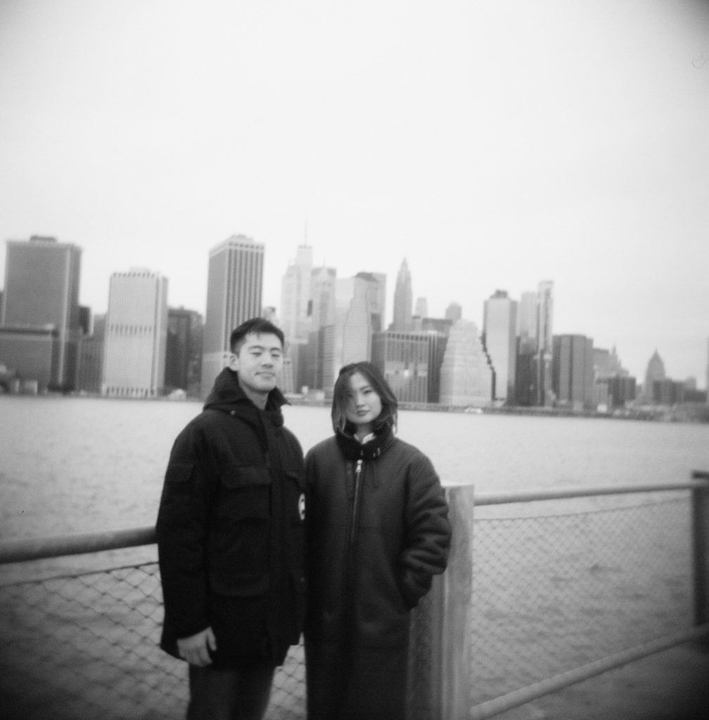Black and white film photo of NYC couple