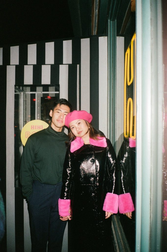 Fashionable NYC couple poses together for film photo