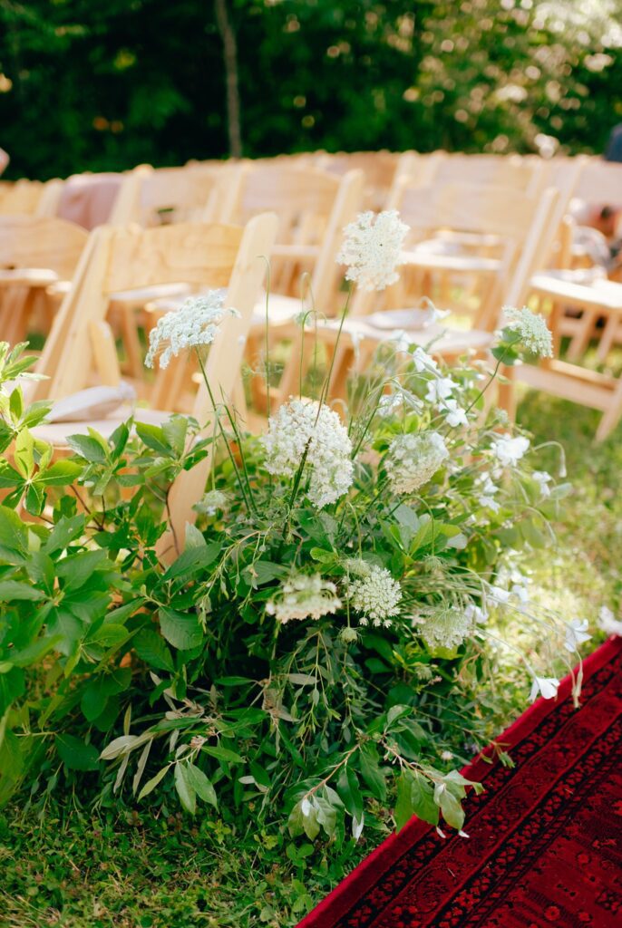 Film photograph of bohemian wedding decorations around ceremony space