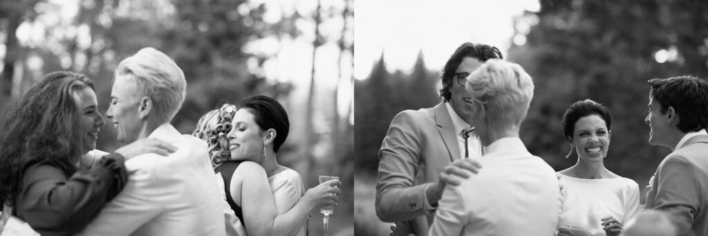 Black and white film photographs of guests embracing at wedding