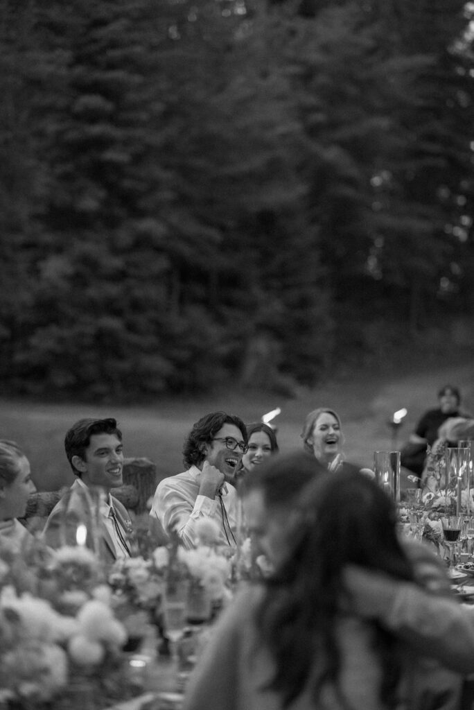 Film photo of guests laughing and celebrating at upstate New York wedding