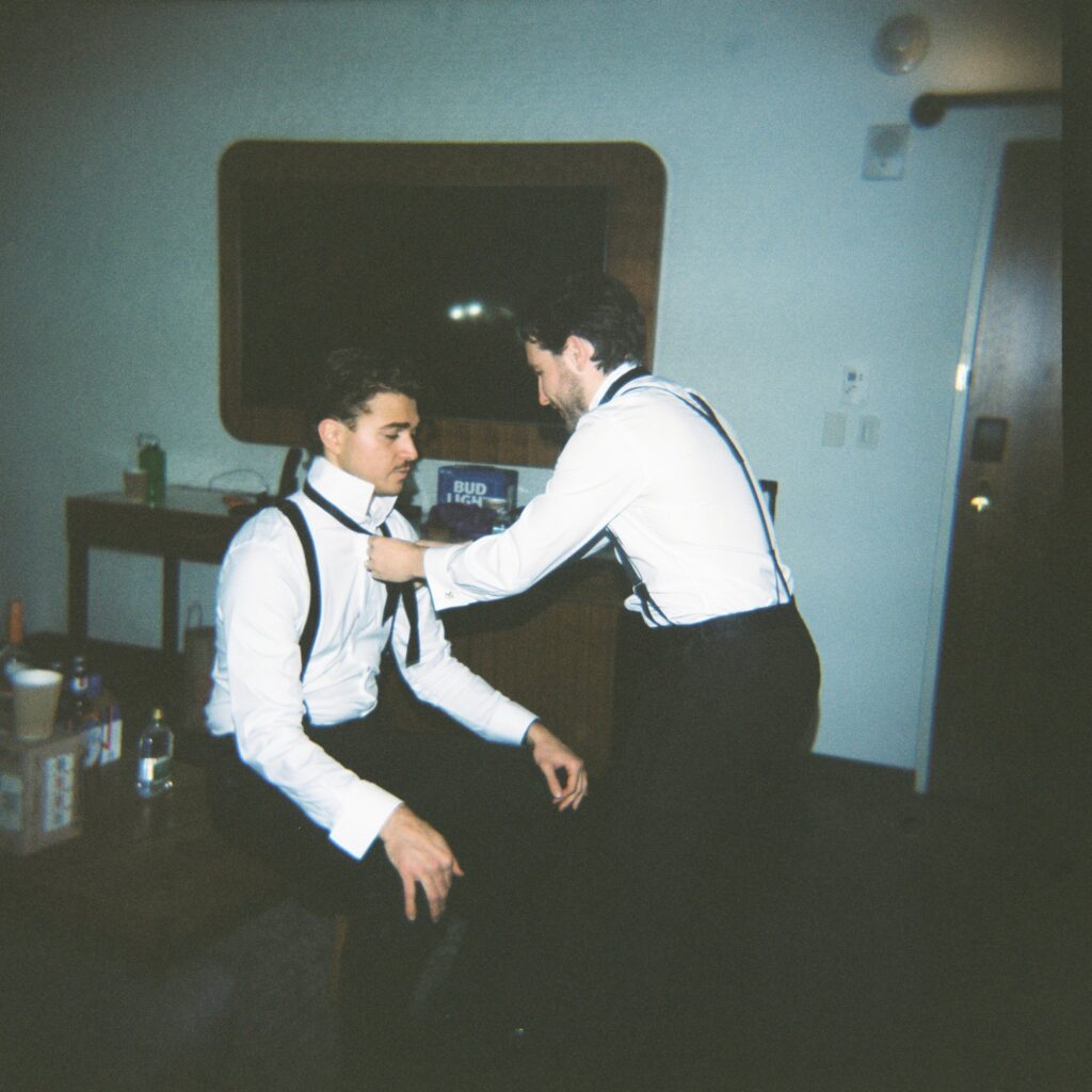 Film photograph of groom preparing for wedding at Artists for Humanity