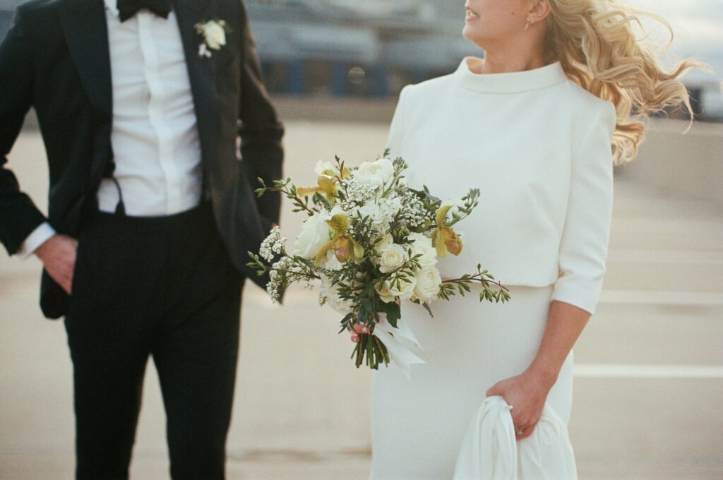 Film photo of bride holding bouquet