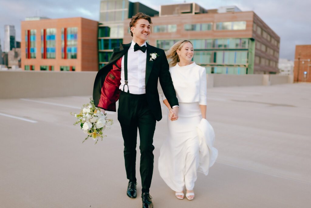 Happy newlyweds walk together, captured on film