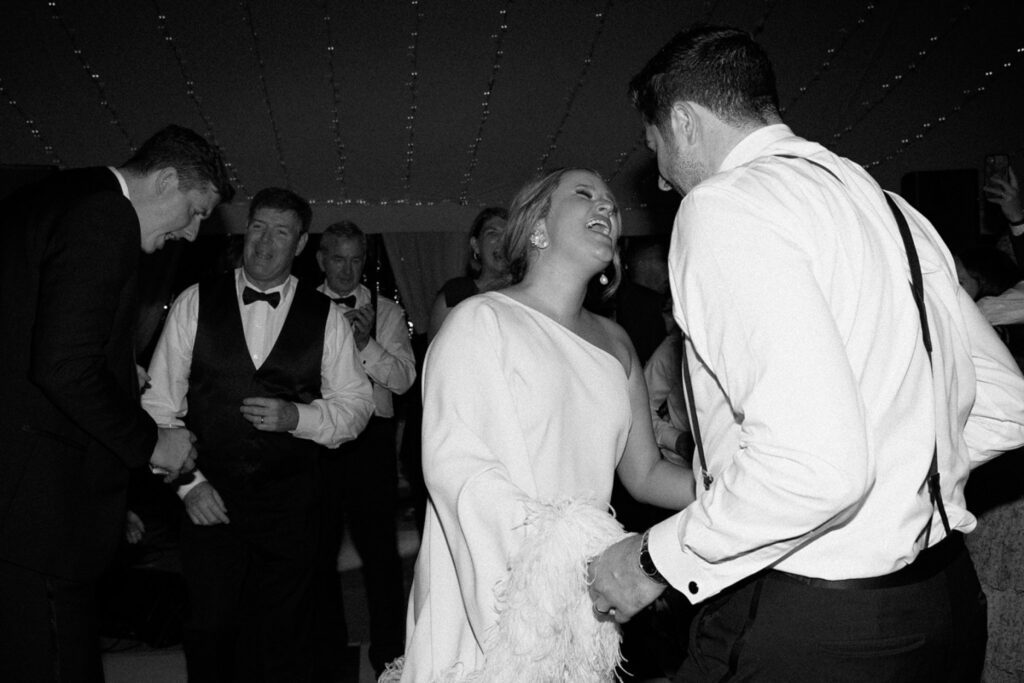 Bride, groom and guests dance at Shepherd's Run reception