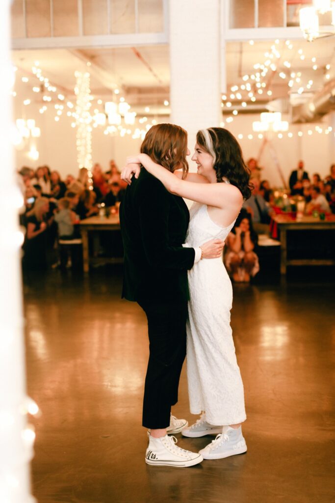 brides share a first dance at the boylston rooms