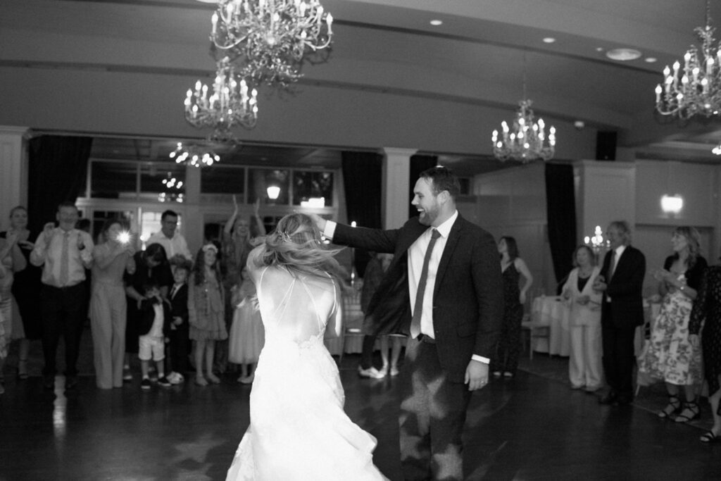 a groom spins the bride at a wedding at Kilkea Castle
