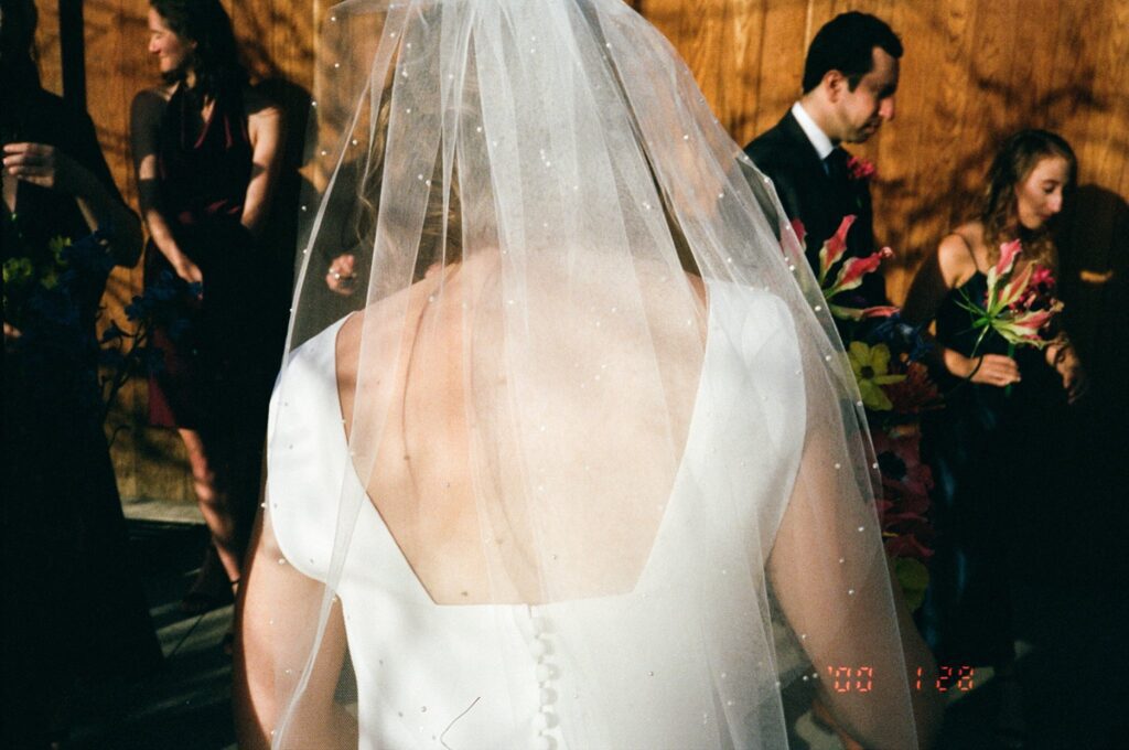 Bridal veil amidst dramatic shadows and lighting, captured on film