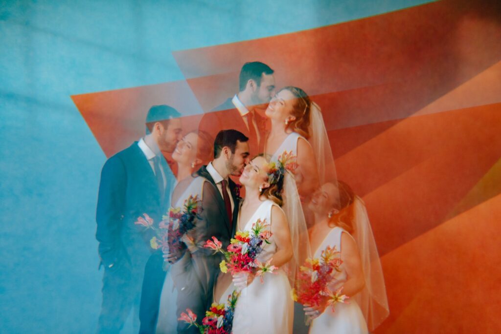 Prism photograph of newlyweds among art at the Mass MoCA
