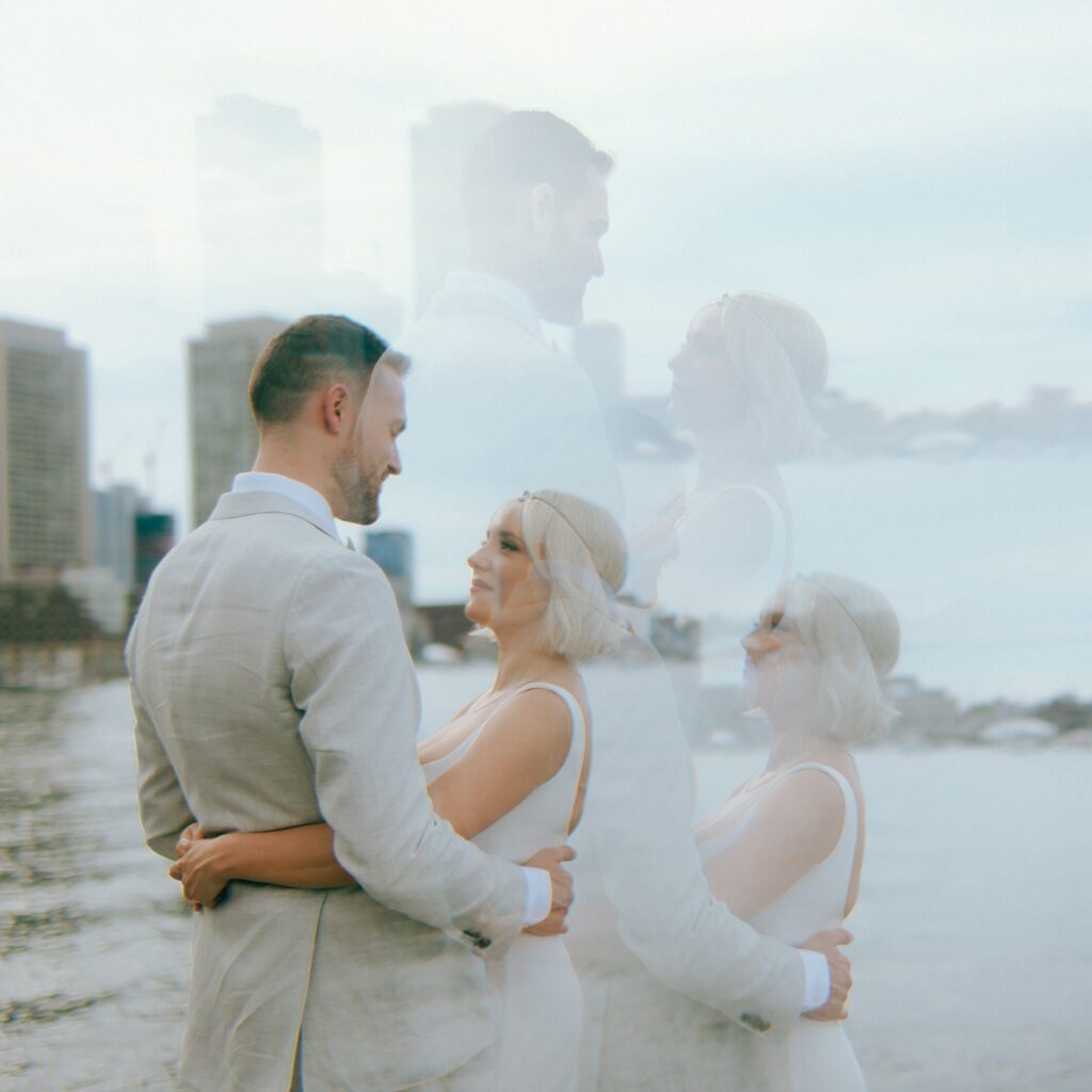 a portrait of a bride and groom taken through a prism