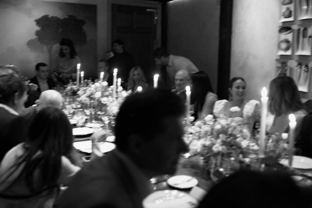 a blurry photo of a wedding reception dinner in New York City