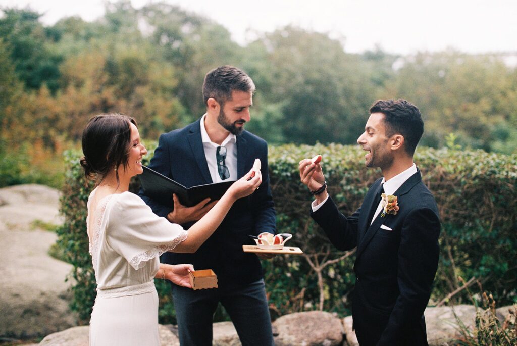 a bride and a groom married on a front lawn