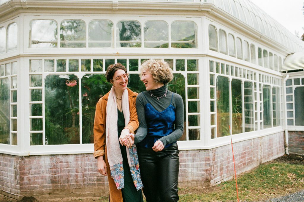 a couple had their engagement shoot at a greenhouse in the Berkshires