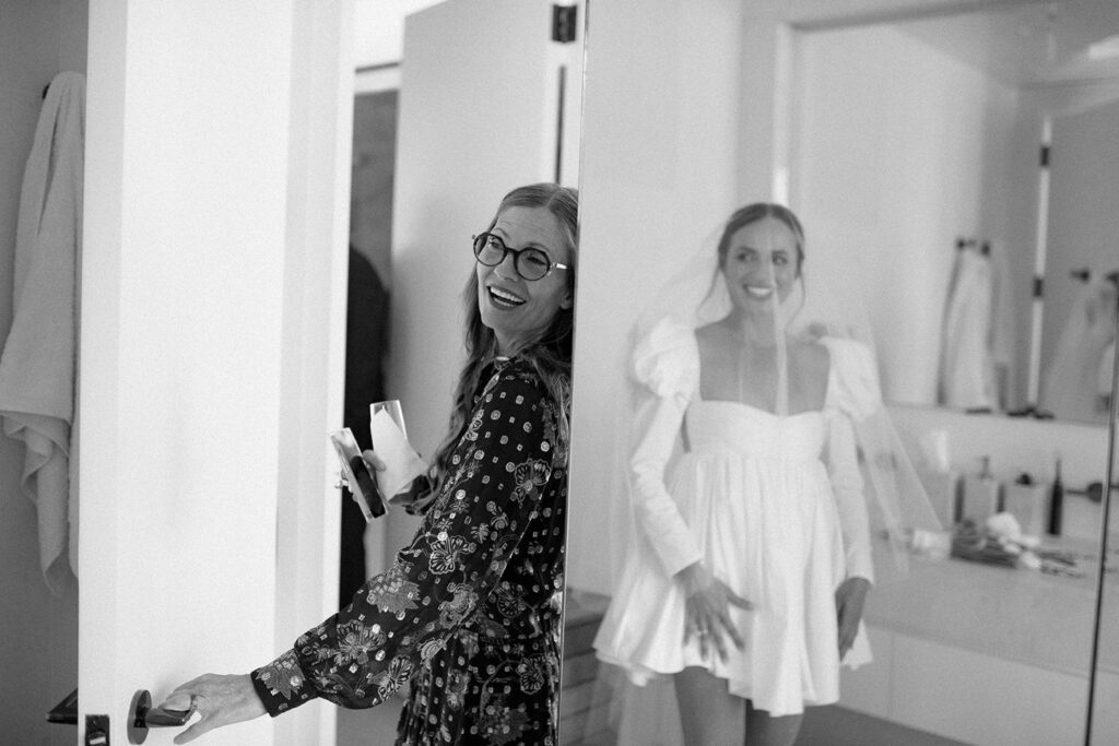 a bride getting ready with her friend