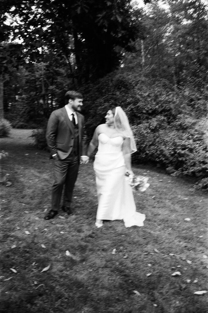 a bride and a groom in a black and white portrait
