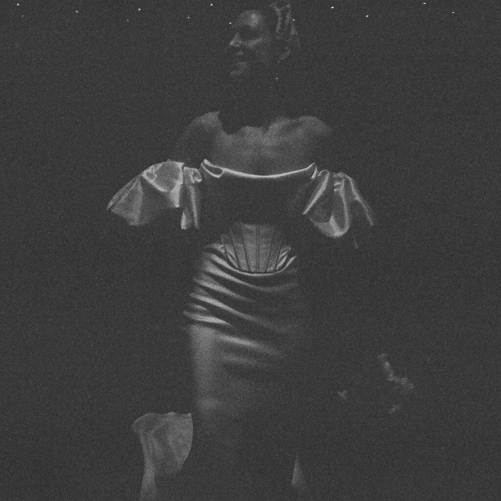 a grainy portrait of a bride laughing 