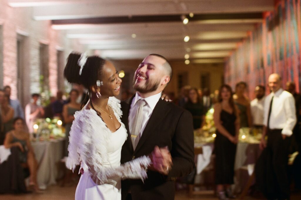 a couple shares their first dance at their wedding 