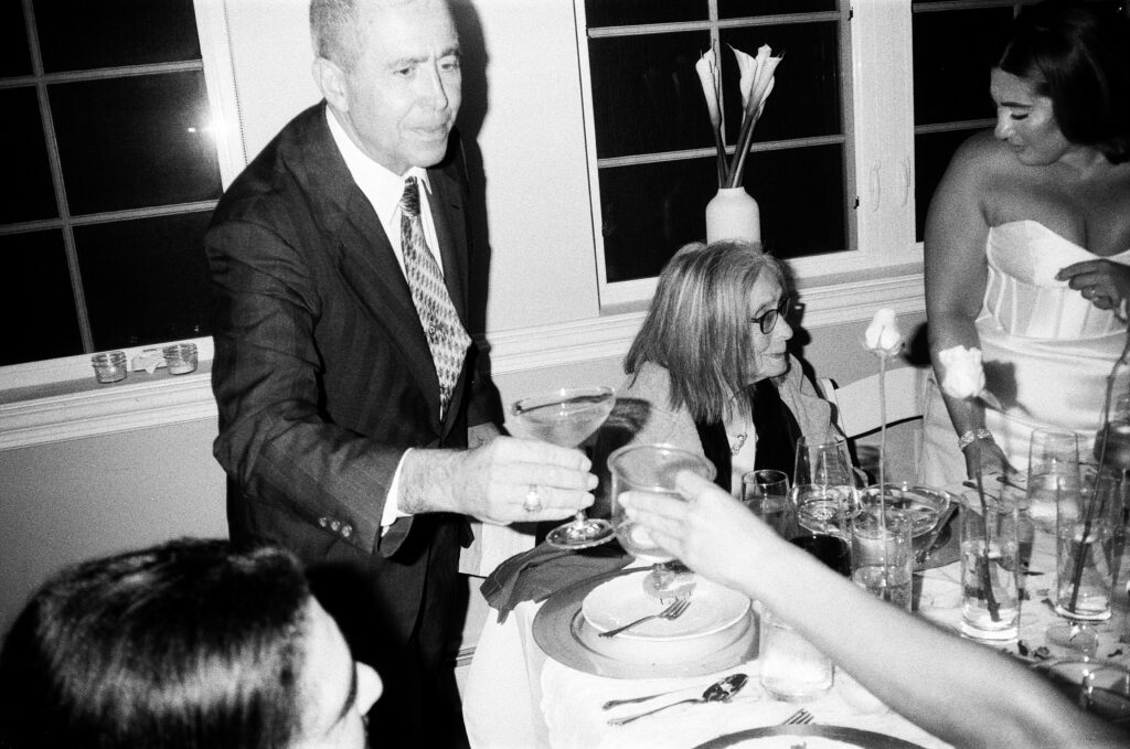 guests toasting during a wedding reception